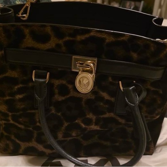 Michael Kors Hamilton satchel featuring a leopard-print calf hair